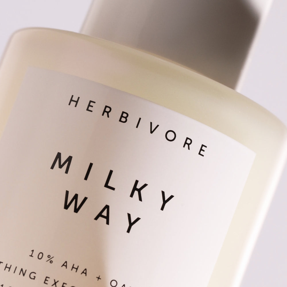 Herbivore Milky Way 10% AHA + Oat Soothing Exfoliating Serum - Deeply exfoliates the surface of skin for instant glow and repairs the skin barrier