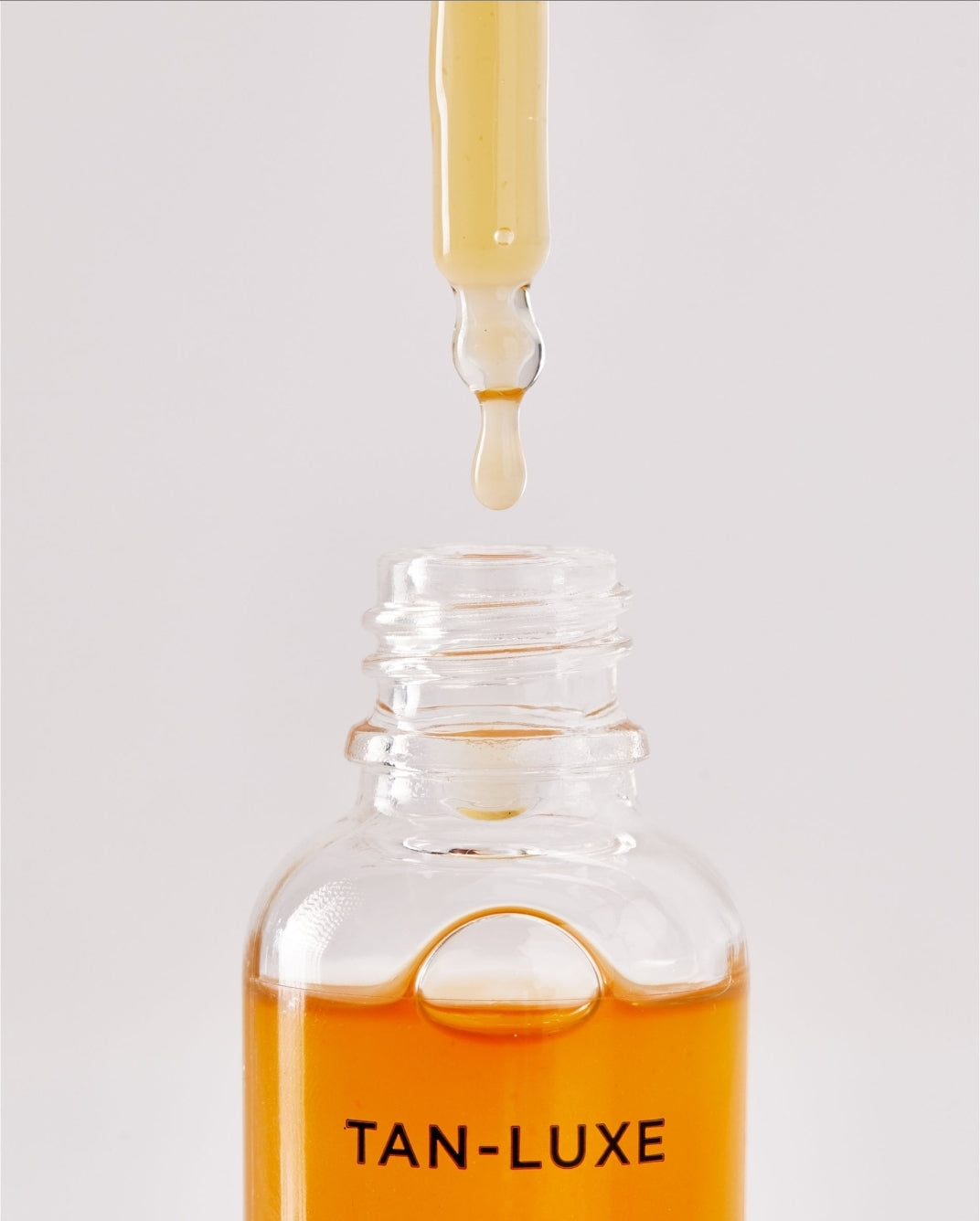 Tan-Luxe The Body - Illuminating Self-Tan Drops Light/Medium